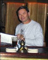 A person sitting at a table

AI-generated content may be incorrect.